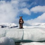 Stonetree Creative - Valkyrie kneeling on Iceberg in Iceland