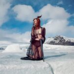 Stonetree Creative - Valkyrie kneeling on iceberg in Iceland