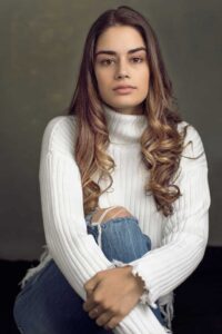 Stonetree Creative - image of college girl in white sweater