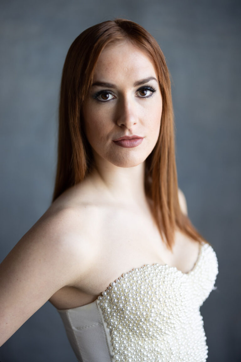 portrait of redheadeded woman before basic retouching