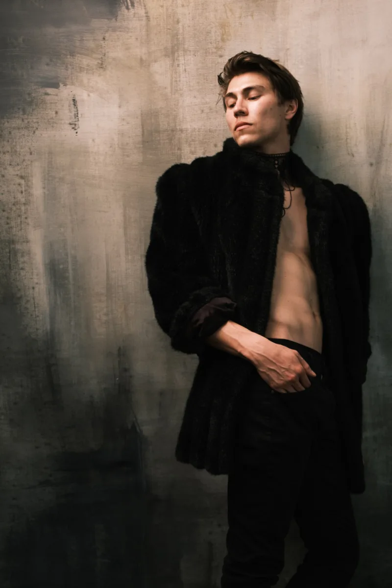 fashion portrait of man in fur coat